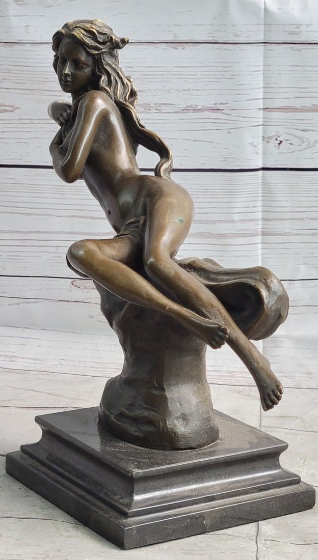 Lady Bronze Sculpture: The beautiful nude woman lays on her right side, suspended in the air as if her support was removed from underneath her once completed. The composition recalls the Classical sense yet adopts a modern 