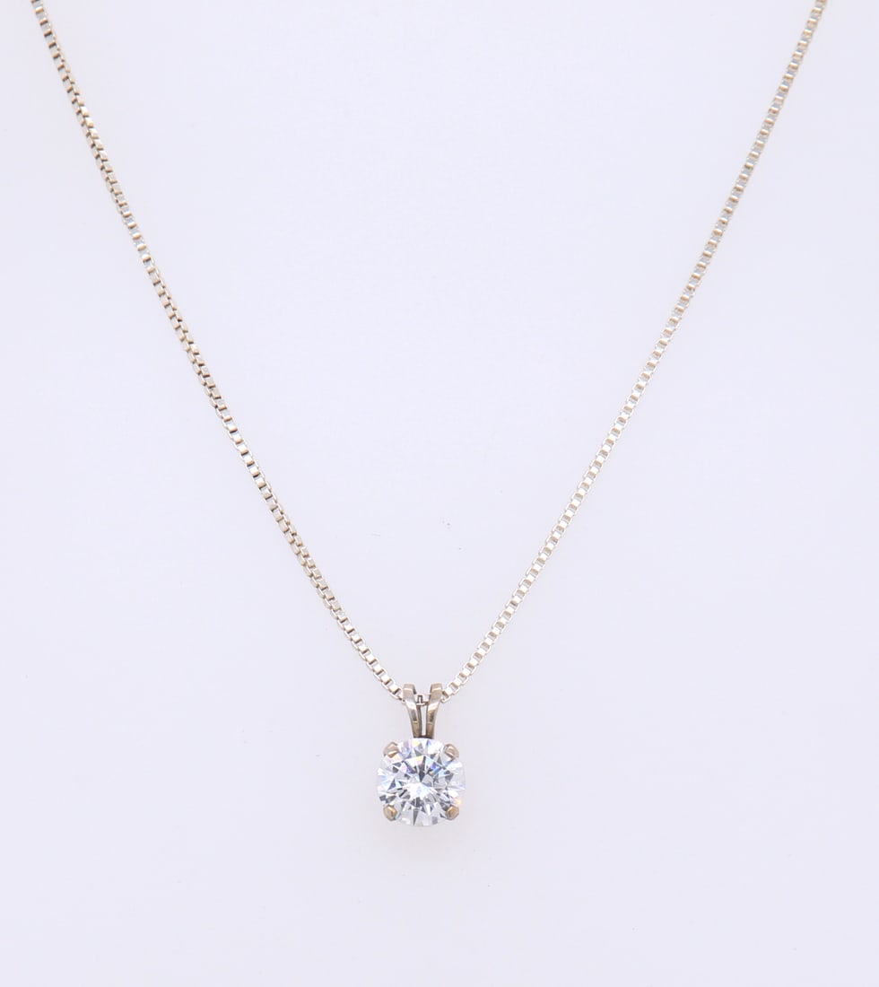 Sterling Silver Cubic Zirconia Pendant on Chain: 925 Sterling Silver Round Cubic Zirconia Pendant on 18" Box Chain Necklace. Total weight of Necklace 4.5 Grams.