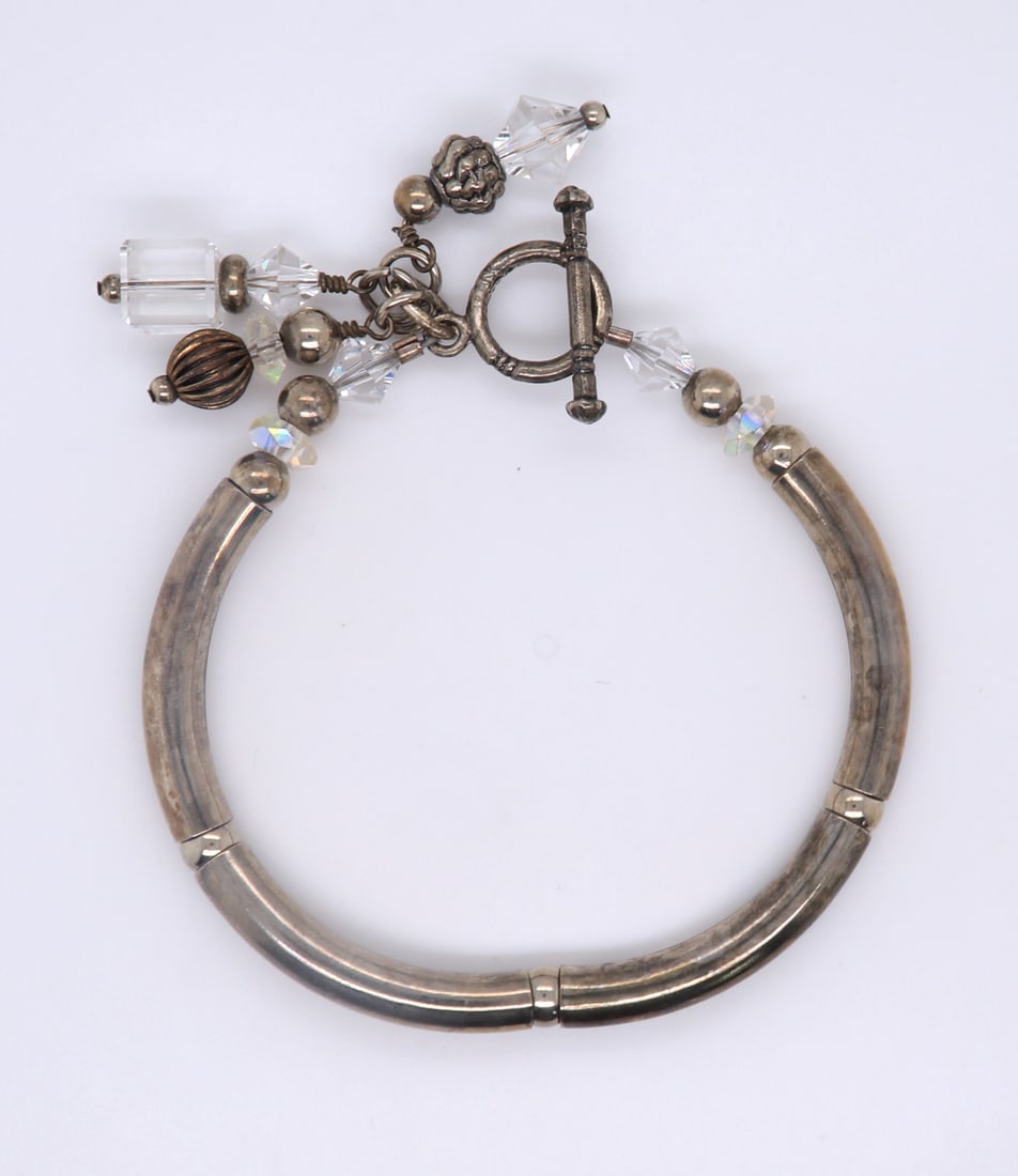 Sterling Silver Bracelet with Crystal Charm: 925 Sterling Silver 7 inches Bracelet with Crystal Charm. Total weight of Bracelet 13.5 Grams.