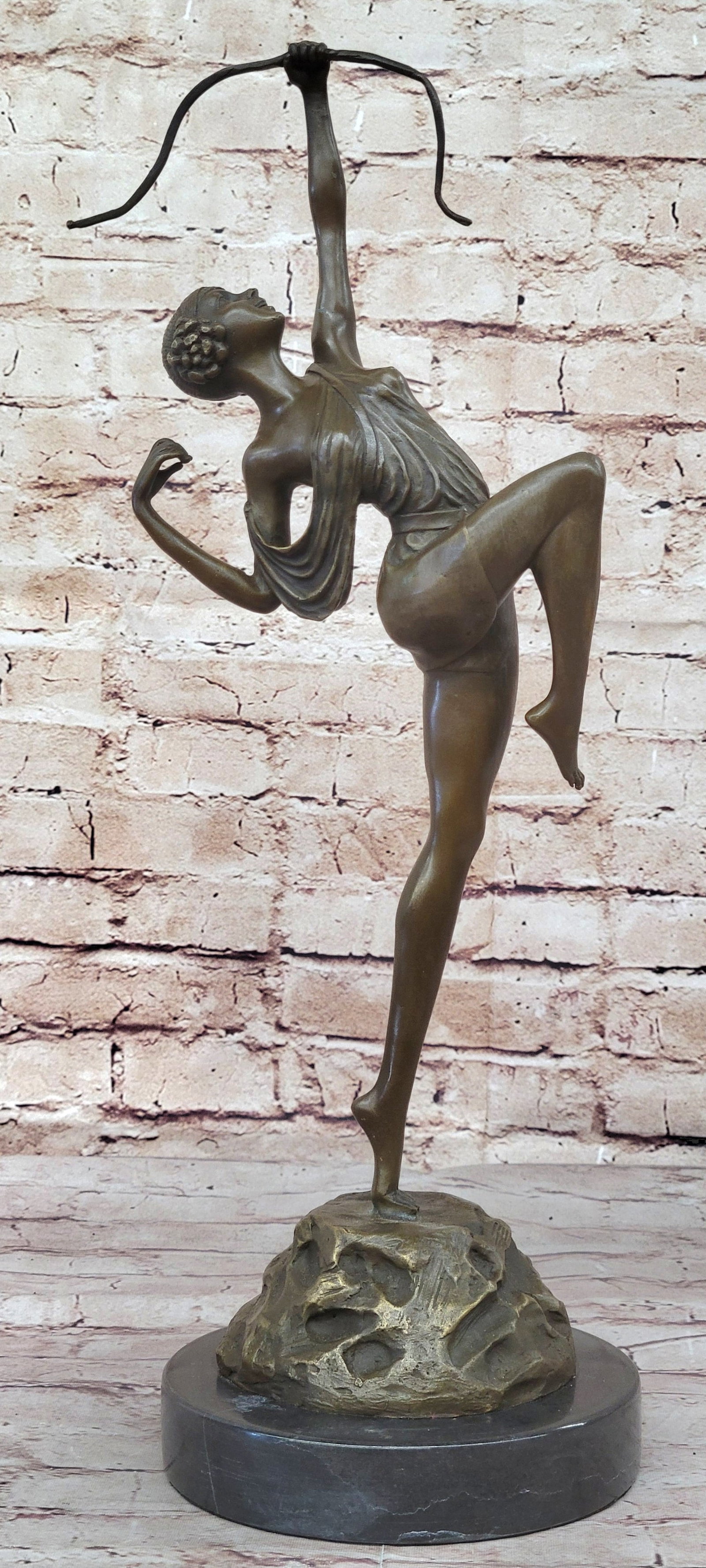 Dianne Hunter Bronze Statue: This piece is a gorgeous representation of the Greek goddess, Diana. In Roman mythology, Diana was the goddess of the hunt, being associated with wild animals and woodland, and of the moon. Diana was 
