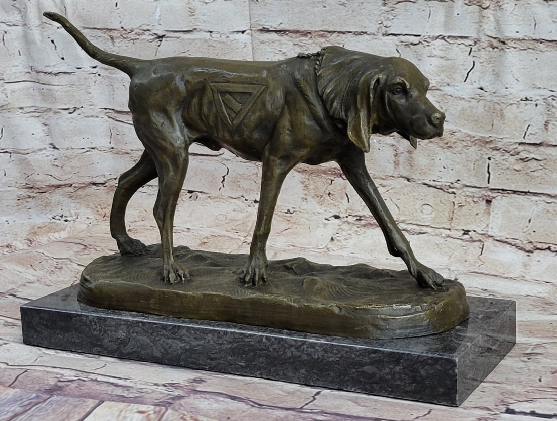 Bloodhound Dog Bronze Sculpture: The Bloodhound is a large scent hound, originally bred for hunting deer, wild boar, and, since the Middle Ages, for tracking people. This is a beautiful Bronze Sculpture cast using the Lost Wax