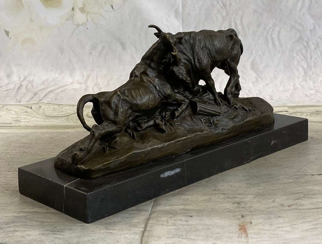 Combat De Taureaux Bronze Statue: This is an exceptional bronze by Jean-Baptiste Auguste Clesinger it depicts Combat De Taureaux (A pair of sparring bulls). This classic dual shows the magnificent beasts going head to head. Clevinger