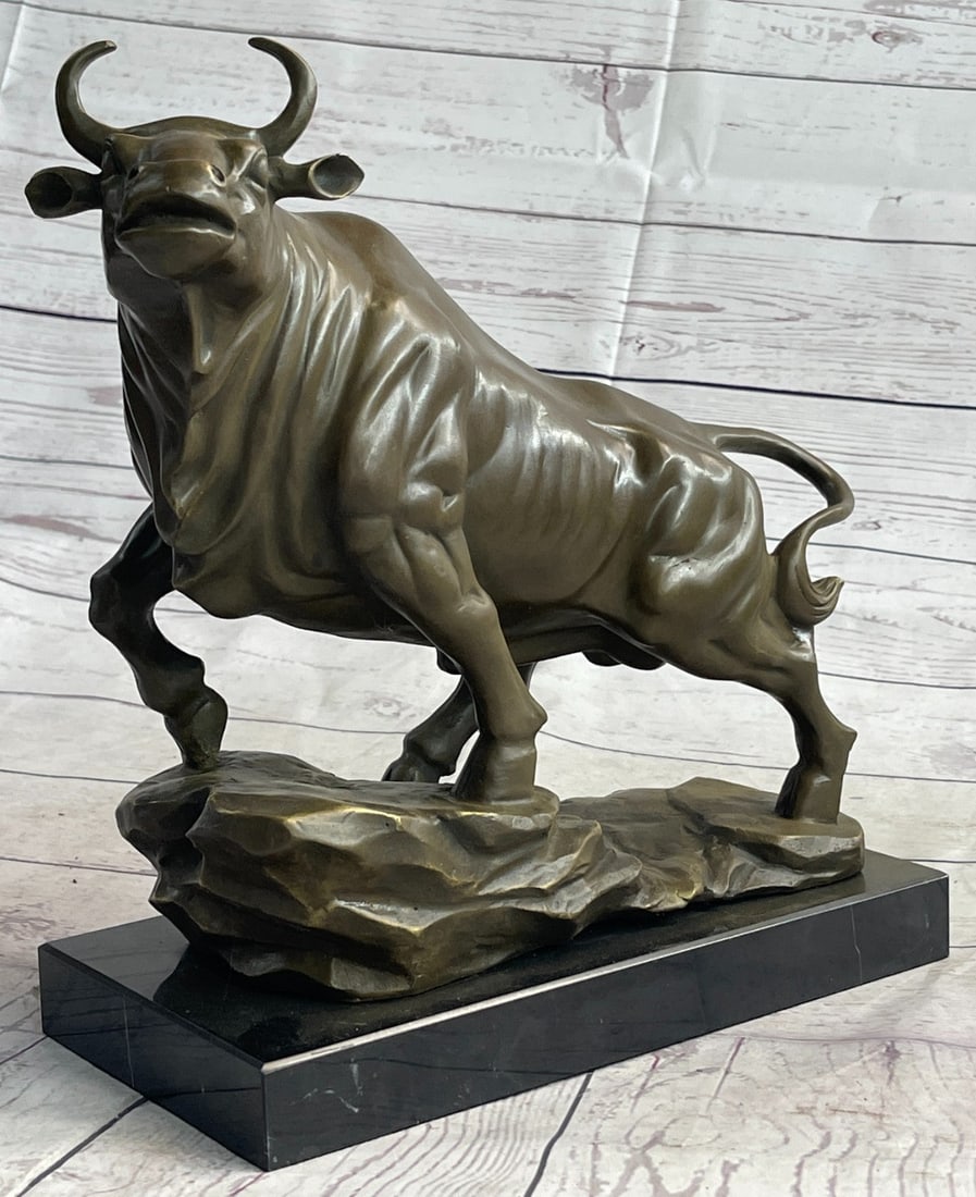 Fighting Male Bull Bronze Sculpture: He starts in a small trot and slowly begins to gain speed as he runs forwards. He is attentive and alert, his horns are sharp and he is ready to charge. Although beastly and burly he is an