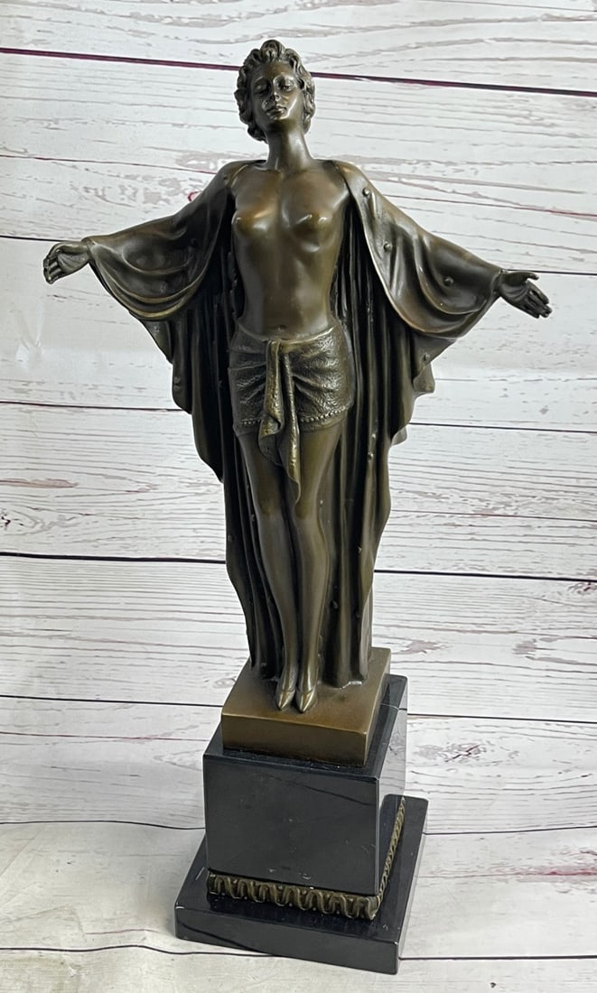 Art Nouveau Nude Woman Awakening Bronze Sculpture: This beautiful Art Nouveau bronze sculpture of a nude woman is signed by the artist, Phillipe. This sculpture has a fluid line of movement and is mounted on a marble base. It features a nude woman in 