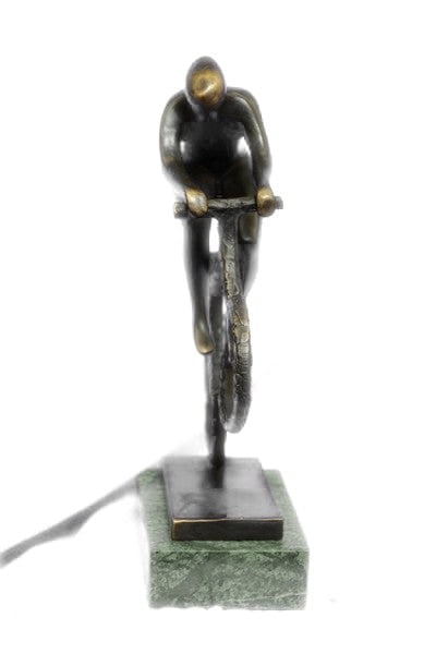 Cyclist Bronze Sculpture: A cyclist tucks his head and kicks onward in a feat of strength. A testament to perseverance and athleticism, this Sculpture makes a statement standing proudly on your bookshelf and shines in a place 