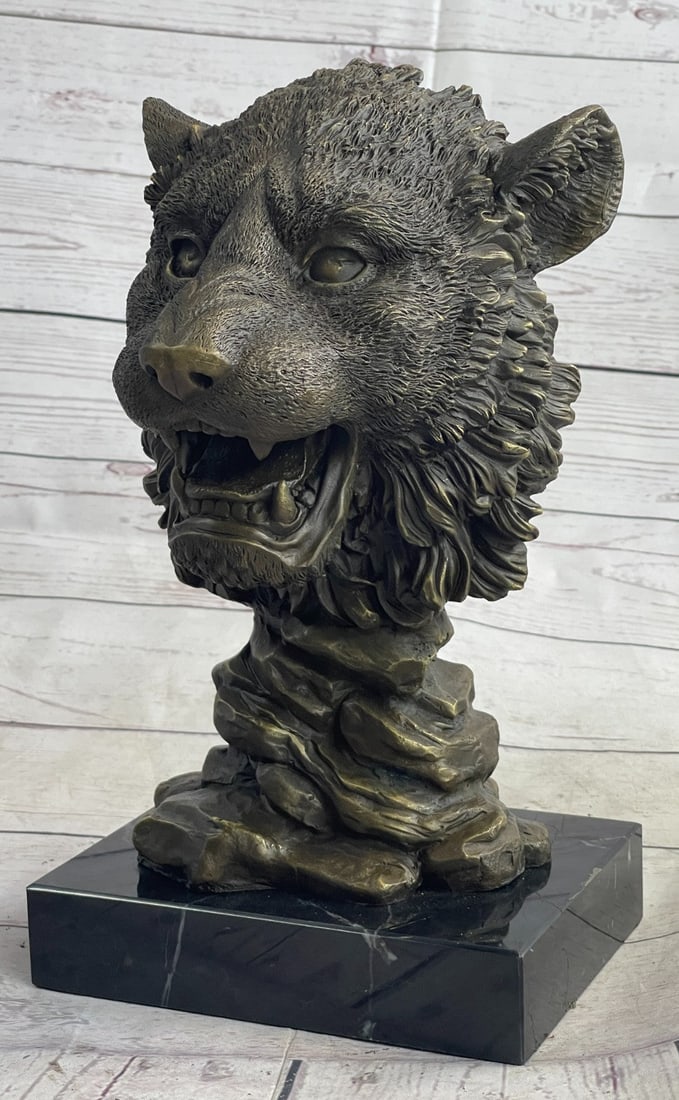 Royal Lion Head Bronze Statue: With stealth and breathtaking beauty, this Male Lion peers deep into the distance, instilling a sense of respect and exuding natural beauty. This bronze bust of a Lion captures the true characteristic