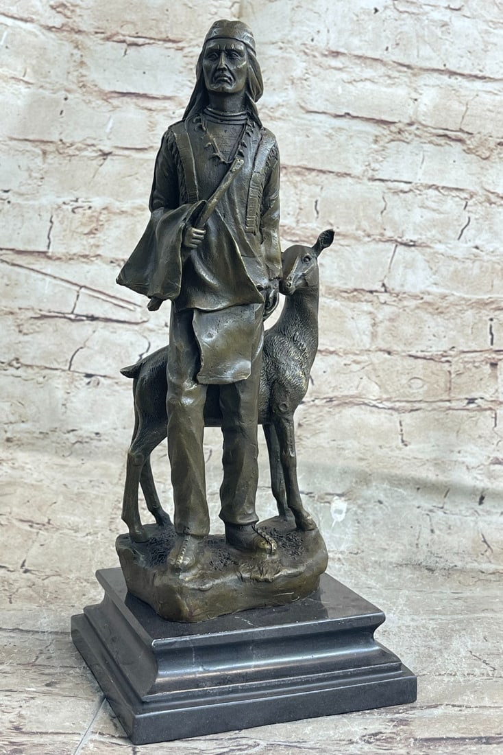 Native American Chief Spiritually Bronze Sculpture: The Native American warrior can be imagined walking through a wind-whipped forest, strolling with a deer in, looking high into the sky that appears and disappears through the dancing leaves of treetop