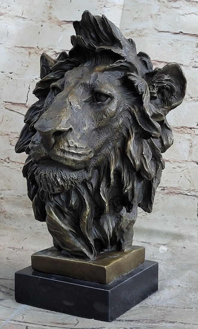 African Lion Bust Wildlife Bronze Sculpture: With piercing eyes and a serious look, this lion is intimidating just by a glance. The exotic Lion Bust Sculpture expertly captures the majesty of this noble lord of the jungle and savannah. The handc
