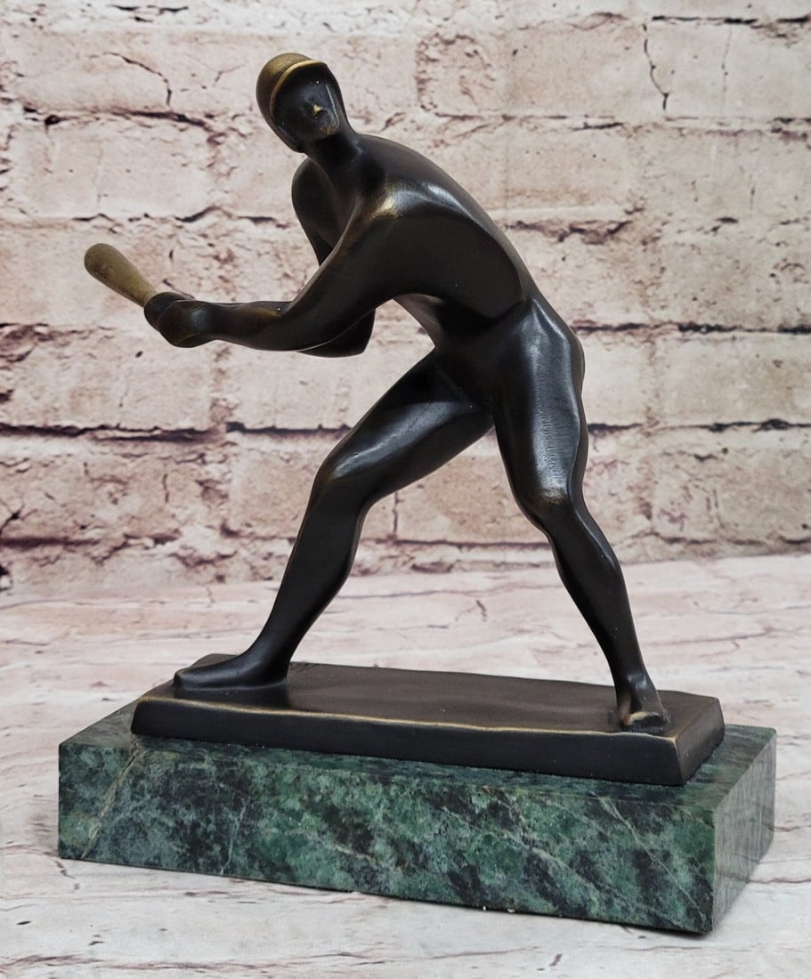 Mid Century Baseball Player Bronze Sculpture: His up at-bat. He eyes the pitcher to see what his pitch might be. The ball spirals towards him. He times it and then swings. He plants his feet. His knee bends and his torso twist with the swing. He 