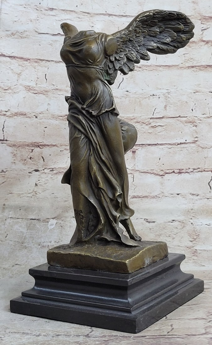 Grand Tour Goddess of Victory Nike Bronze Sculpture: This replica cast in bronze is of the Winged Nike of Samothrace, one of the most important and beautiful surviving masterpieces of antiquity. In Greek mythology, Nike, also known as the Winged Goddess