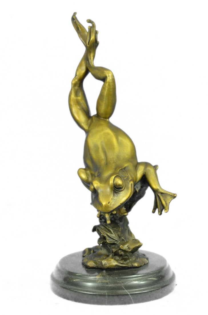 Gild Prince Frog Gold Patina Bronze Sculpture: The Bronze frog is a secretive species, hiding under vegetation near ponds, creeks, and rivers. It may be difficult to find until warm, humid evenings when its mating call is heard. Their diet include