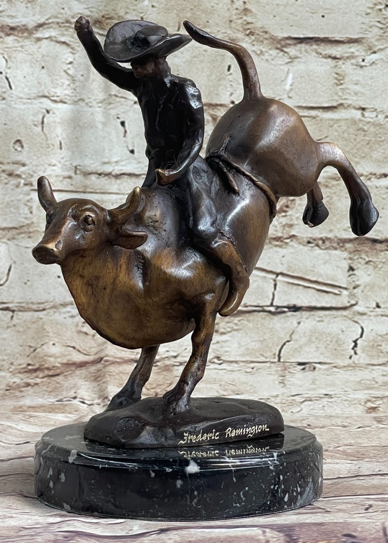 Rodeo Rider Bronze Sculpture: A seasoned cowboy courageously rides a bucking bull in the center of the rodeo. The bull leaps, kicks, and twist raising the cowboy high off the ground but his grip on the reins never break. He holds 