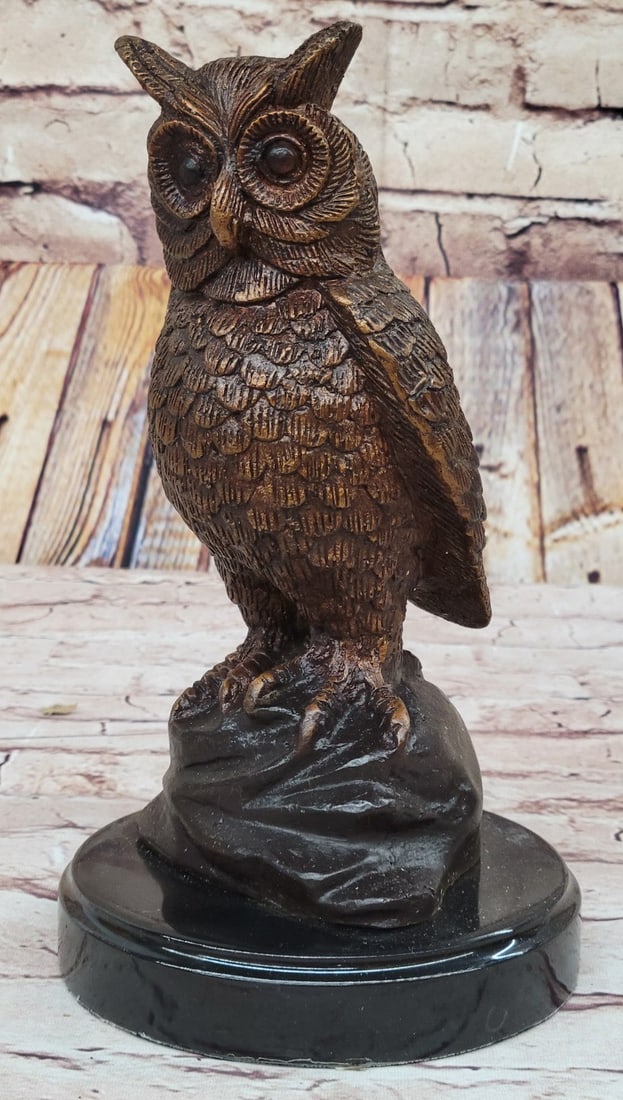 Owl Bird Bronze Sculpture: A quaint owl rests upon his perch, looking out into the night sky. His innate ability to listen keeps him occupied as he listens to the sounds of the night, waiting to hear the scurry of a mouse so