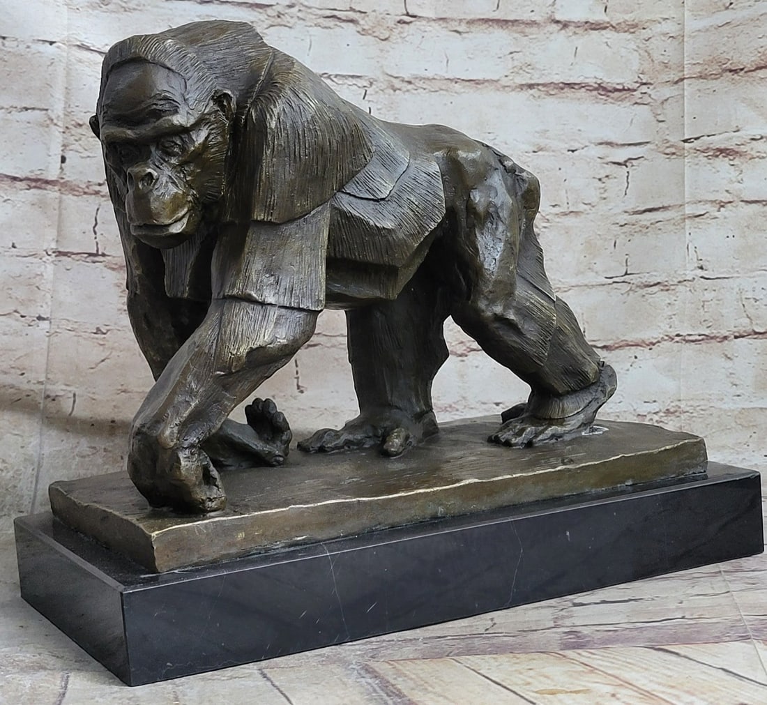 Mighty Brazilian Gorilla in Jungle Bronze Sculpture: She is an absolutely gorgeous specimen of the gorilla silverback race. Her body and arms are proportioned perfectly and she has an amazingly beautiful face. This sculpture shows the irony of how a