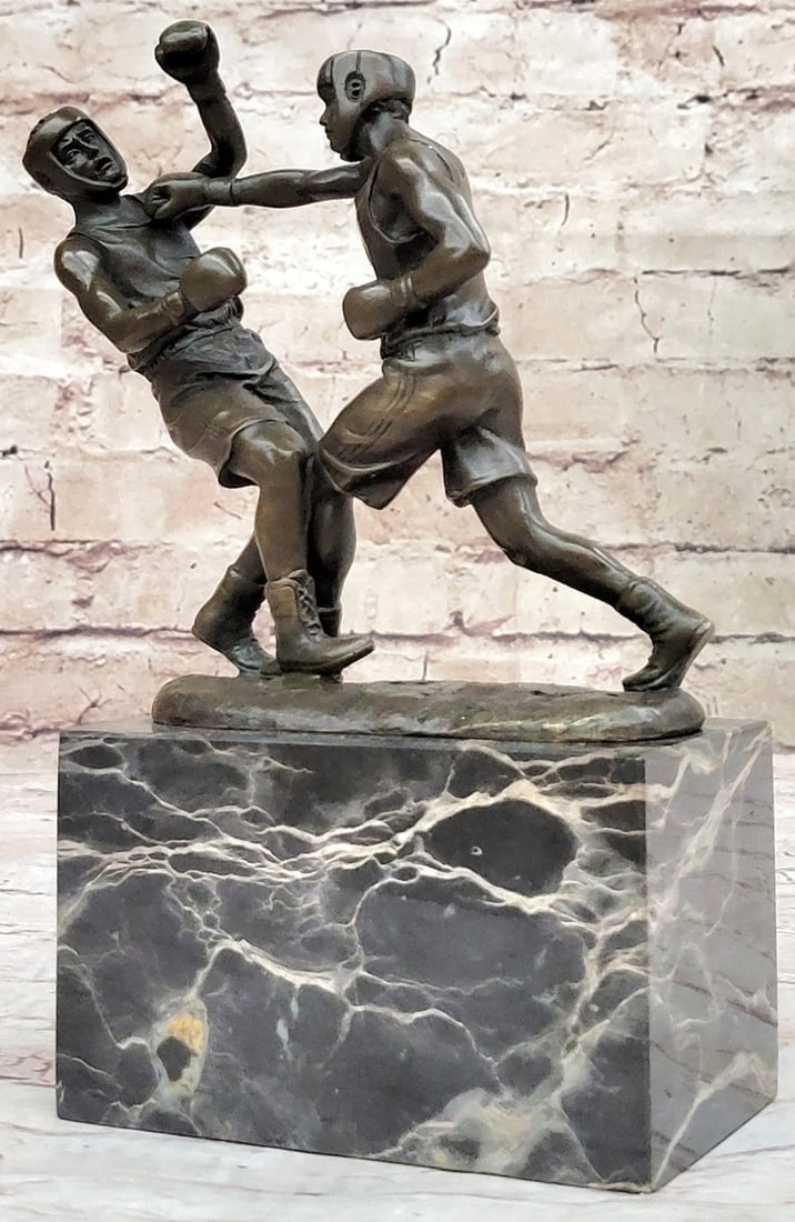 Last Round Boxing Bronze Statue: It is the last round of the match and the odds are not looking good for one box. He steps back in reaction to the stiff punch that has just hit his jaw. The adept boxer is weary yet he powered