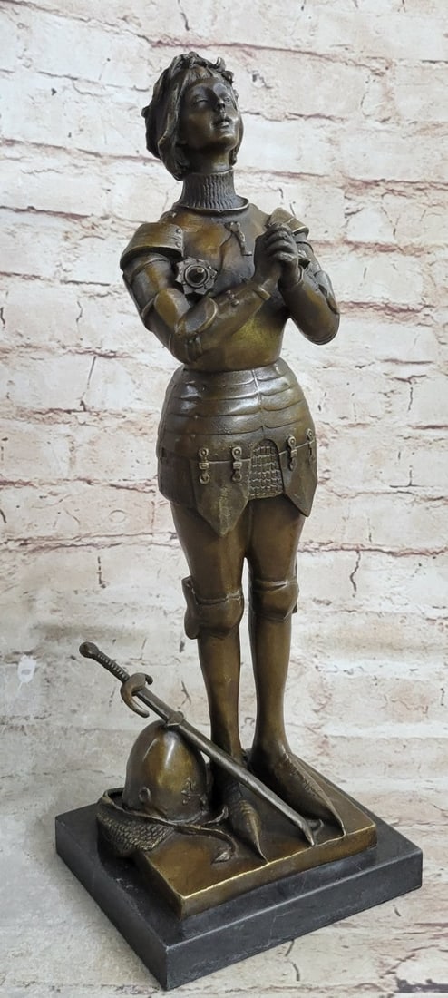 Saint Joan of Arc Bronze Sculpture: This Bronze Sculpture of Saint Joan of Arc or The Maid of Orleans was a peasant girl born in eastern France who claimed divine guidance lit her path. Visions from God instructed her to recover her hom
