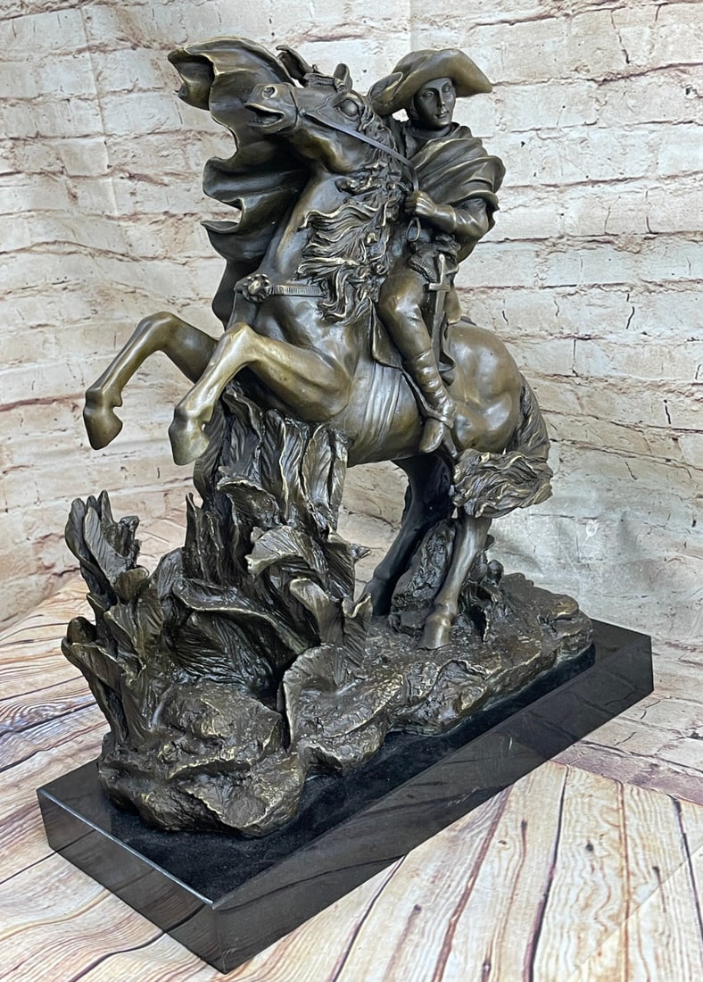 Napoleon Crossing the Alps Bronze Sculpture: Napoleon Bonaparte was born August 15, 1769, in Corsica to parents of noble Genome ancestry and trained as an artillery officer in mainland France and died May 5, 1821. He was a military and