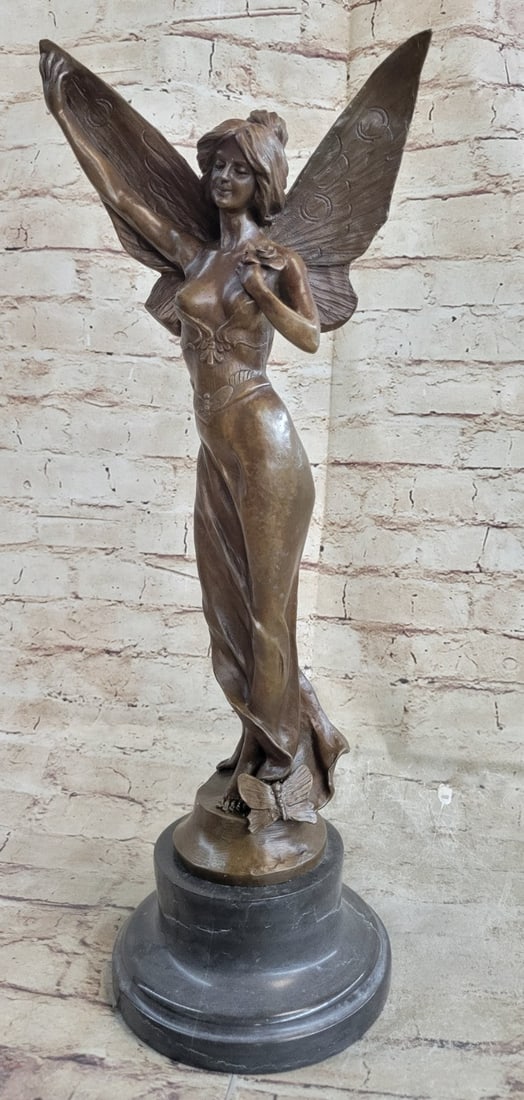 Fairy Butterfly Angel Bronze Sculpture: Daydreamers will fall in love with this daydreaming fairy. She wanders around the mystical forest, her eyes taking in all the magic around her. She is lulled by the soft sounds of life and fantasy