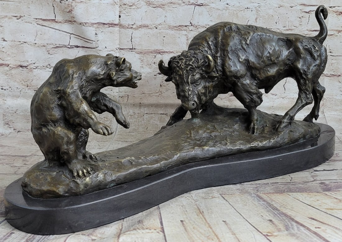Bull and Bear on Marble Base Sculpture: The Bronze Sculpture captures the saga of the ceaseless keeping of the balances of life and death seen here between two majestic creatures in the natural world. The buffalo and bear seem to have