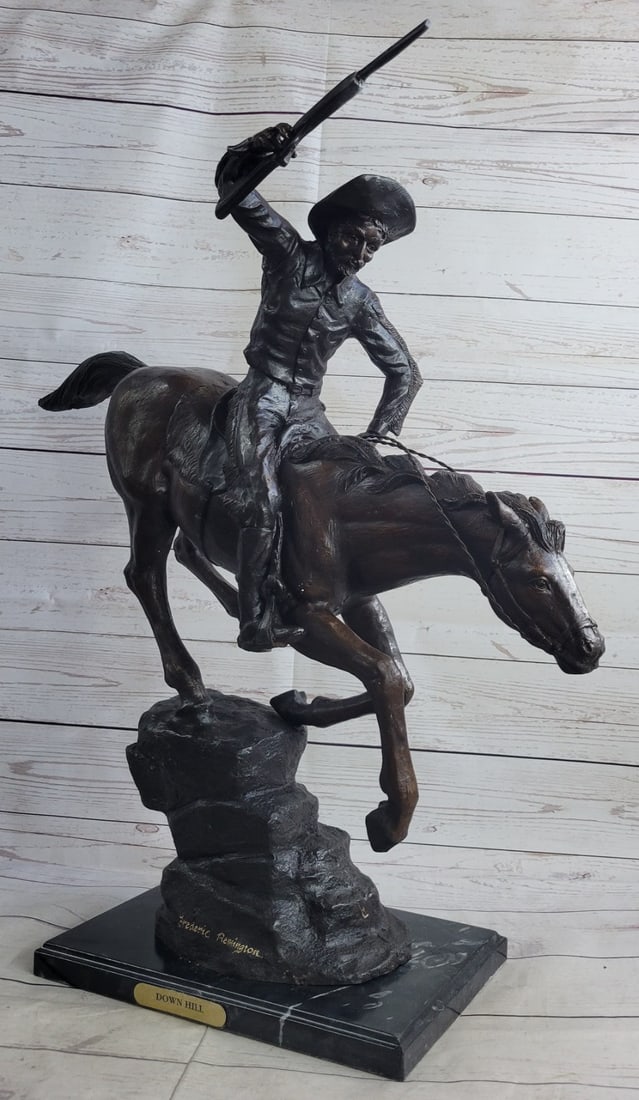 Cowboy with Gun Bronze Sculpture: This Sculpture was to manipulate each individual wax to his liking making each casting with different characteristics. This Sculpture is very appealing to the eyes giving you dimension, depth, and