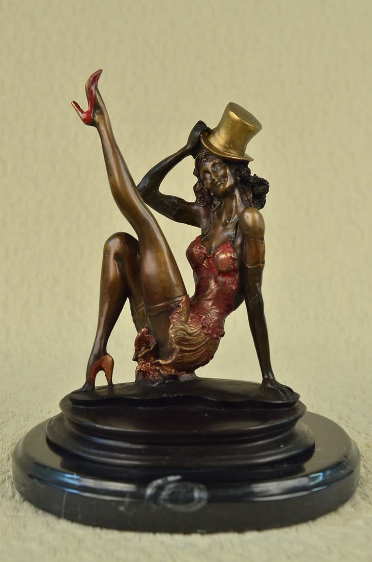Jazz Dancer Bronze Sculpture: With style, grace, and ease she leans back while she is squatting in her heels and kicks up her long lanky leg, and takes her hat off to you. This sultry Lil burlesque dancer knows all the right moves