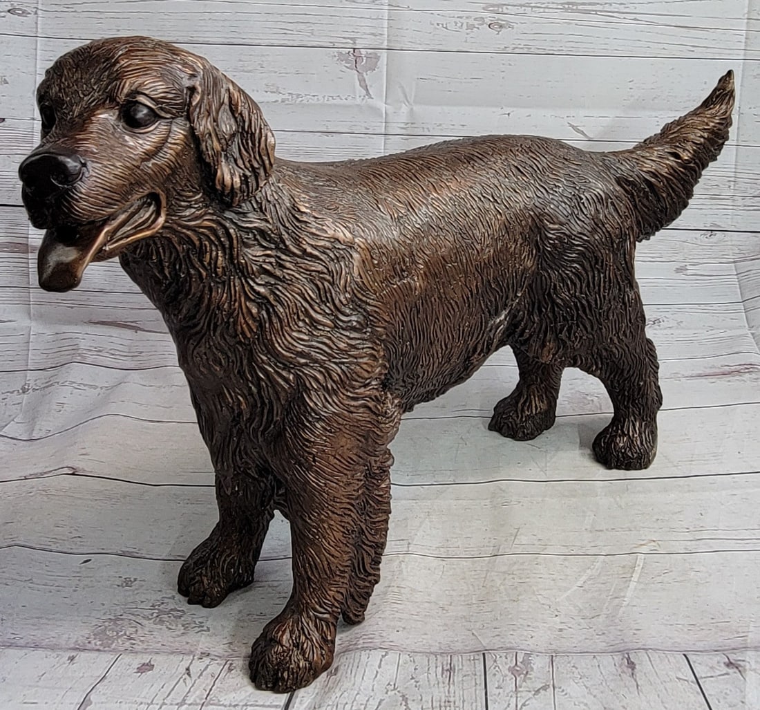 Puppy Golden Retriever Dog Bronze Statue: This is an adorably accurate Statue of a young retriever dog. These are energetic, lovable, well-mannered, intelligent dogs with great charm. They are easily trained, and always patient and gentle