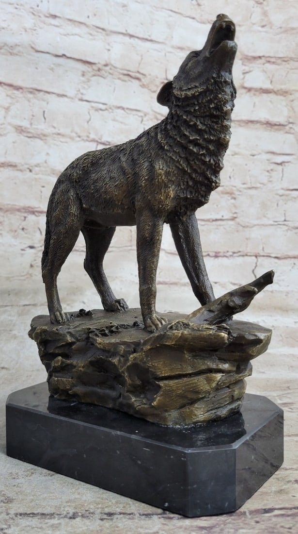 Howling Wolf to the Moon Bronze Sculpture: When people think of wolves they think of their lethal hunting skills, howling, and the pack. The creation of a wolf family is unique for animals. Wolves are social predators that live in nuclear