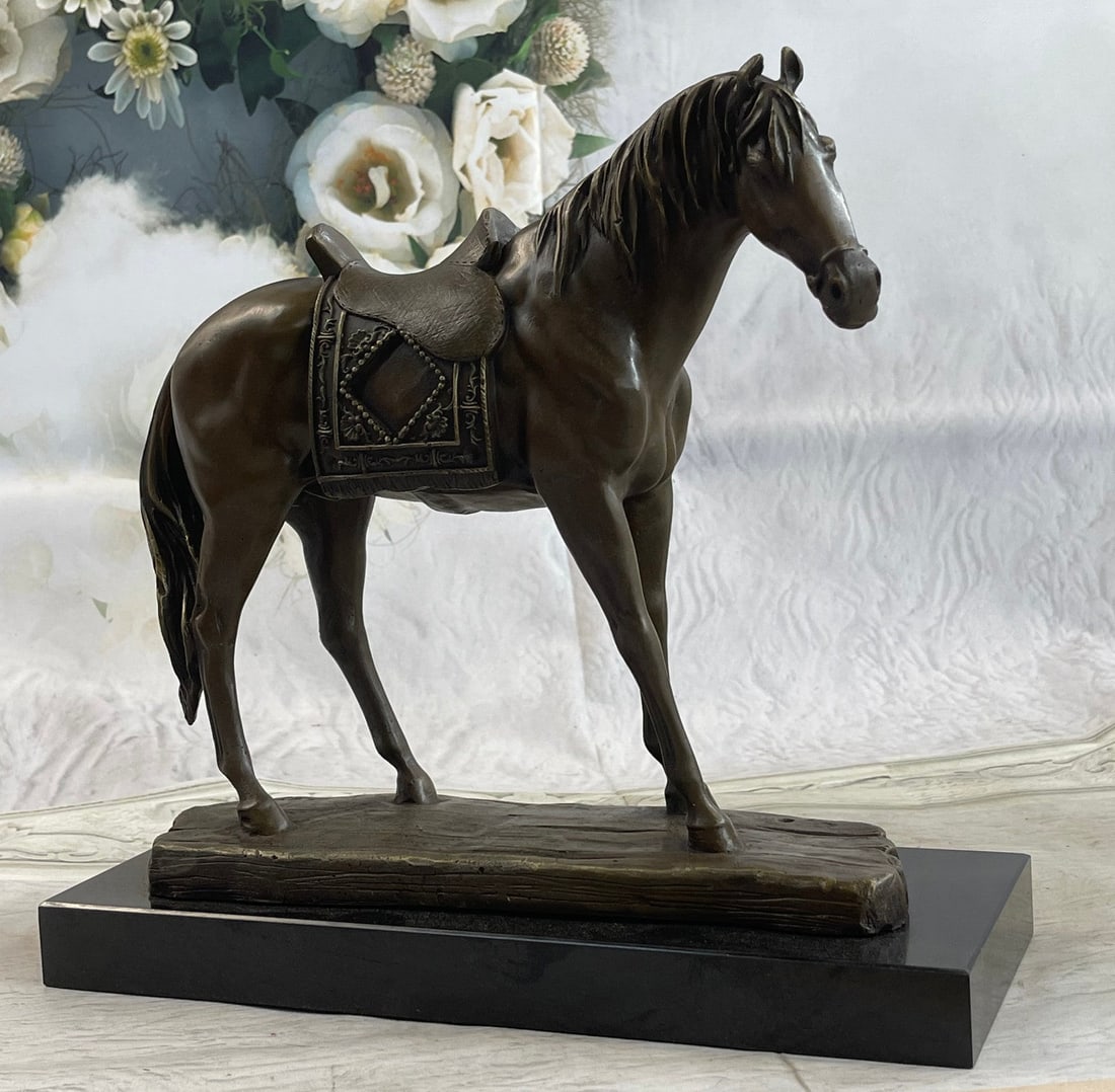 Horse with his Saddle Western Cowboy Bronze Sculpture: Horses are known and loved for their agility, graceful movement, strong bodies, and sleek coat. They ignite a feeling of freedom and uncharted paths. He trots freely in the open land. His eyes widened