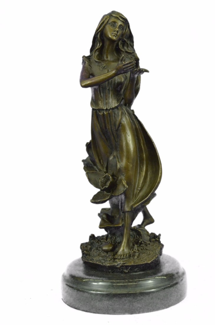 Mother Nature Bronze Sculpture: Get lost in a daydream. She leans back on a tree stump and flowers grow all around her. She stretches an arm out to feel the blossom graze her skin. She is one with them as they curve around her. Her 