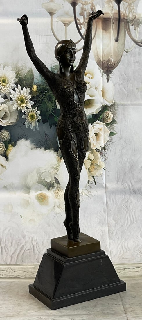 Doura Bronze Statue: Solid Bronze reproduction with a heat applied patina and hot painted accents. A very stylish beautiful reproduction figure after D.H. This Sculpture was cast using the Lost Wax Method and mounted on