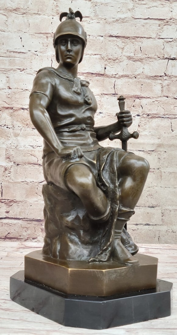 Roman Legion Bronze Sculpture: The Roman legion sits upon a chair in full soldier regalia in a stoic and heroic manner. His stone look shows a dutiful soldier who marches and fights for the gain of his empire homeland. This bronze