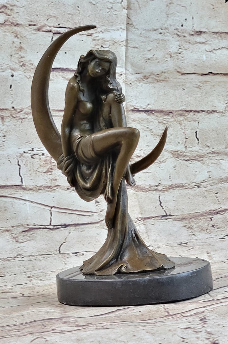 Sensual Female Woman Venus Moon Bronze Statue: This bronze sensual woman sits upward, extending her arms in the air with her legs crossed. Her arms wrap around her head in a grasp of fervor. Her furrowed brow and closed eyes signify her