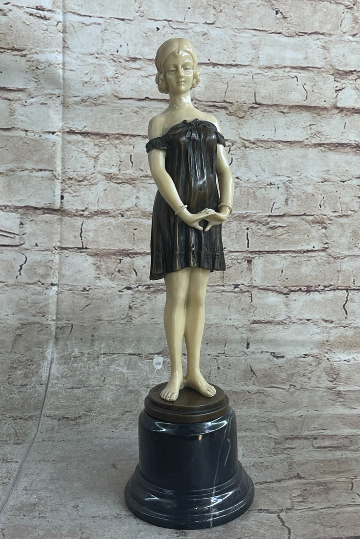 Woman Figurine Bronze Sculpture: This Classic bronze statue of a gorgeous woman is handmade and cast in the traditional Lost Wax Casting Process. This ensures a quality bronze sculpture that may be passed down from generation to gene