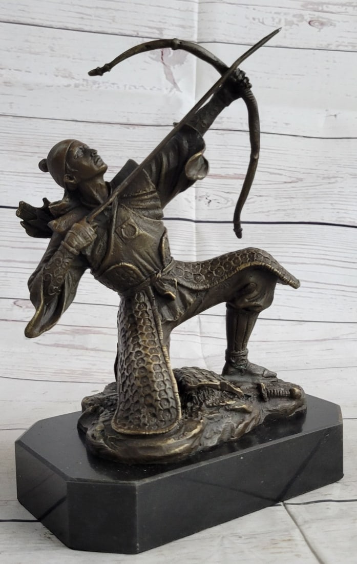 Ancient Samurai Warrior Bronze Sculpture: This Bronze piece was crafted using the Lost Wax Method and coated with a dark brown patina. Dimensions: Height 9 X Width 7 inches. Weight: 7 LBS.