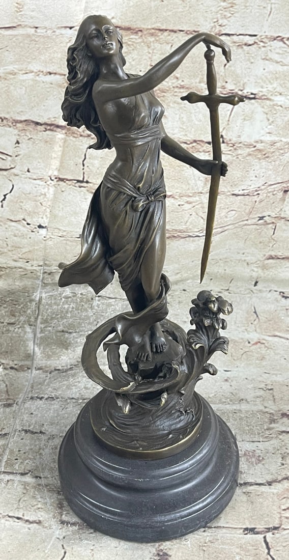 Justice Lady Bronze Sculpture: The bronze sculpture is of Lady Justice Roman goddess of Justice who is the symbolic personification of the moral force in judicial systems. As anciently depicted, the blindfolded Lady Justice is seen