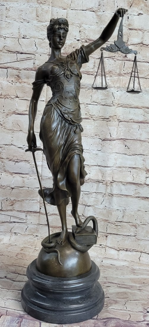 Blind Justice Bronze Sculpture: The bronze sculpture is of Lady Justice Roman goddess of Justice who is the symbolic personification of the moral force in judicial systems. As anciently depicted, the blindfolded Lady Justice, is see