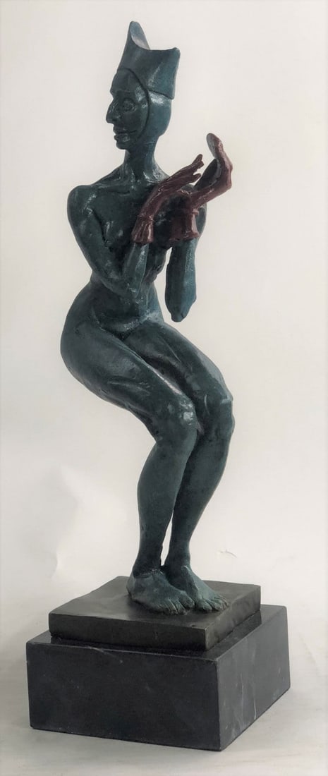 Clown Wearing only Gloves Bronze Sculpture: She Is A Jester And she is completely naked. She Wears A Long Sleeved Fitted Shirt Her Face Is Sweet And she Smiling Wide As She Dances Around. This Is A Beautiful Piece And Captures A Jester In