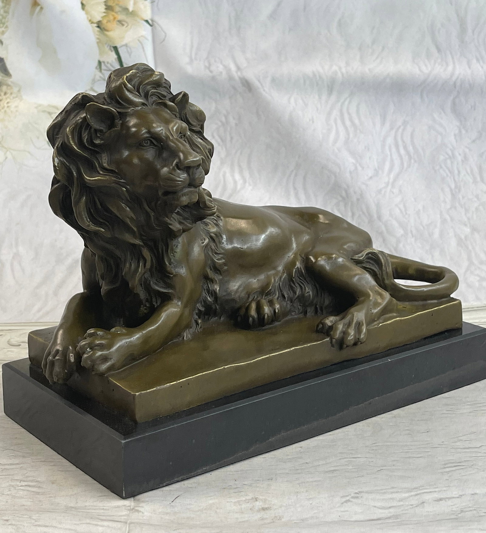Animal Edition Lion Bronze Statue: Lions are brilliant animals, known for their power, courage, and nobility. There is no questioning why these noble creatures land on crests, flags, institution mascots, and coats of arms for many nati