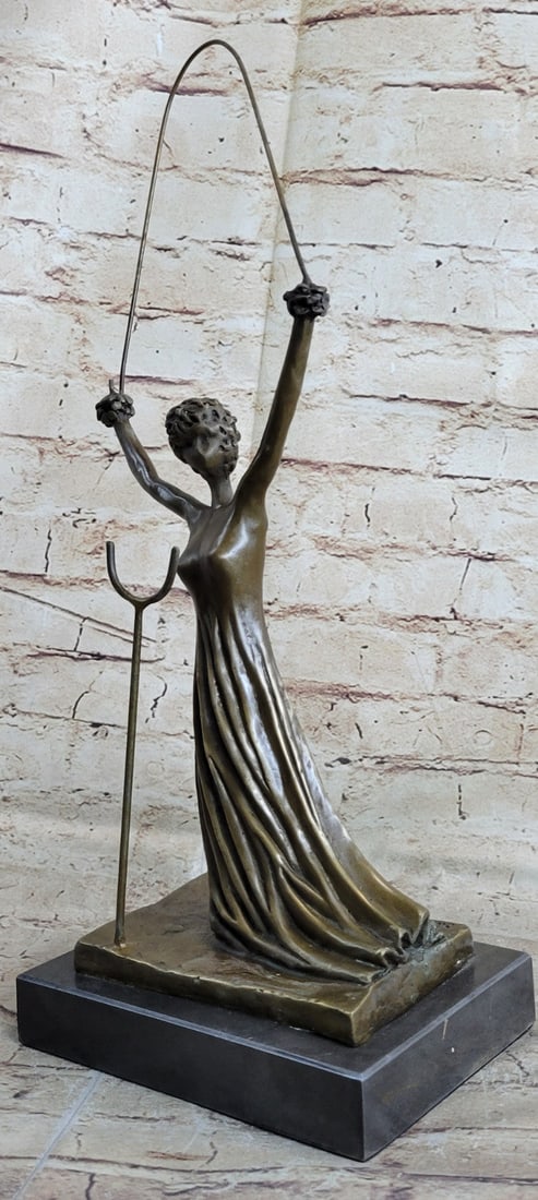 Alice in Wonderland Bronze Sculpture: This eternal girl with her childish naivety and sincerity explains the confusion of the surrealist world. Meeting with the inhabitants of this world does not bring her harm and she comes back out