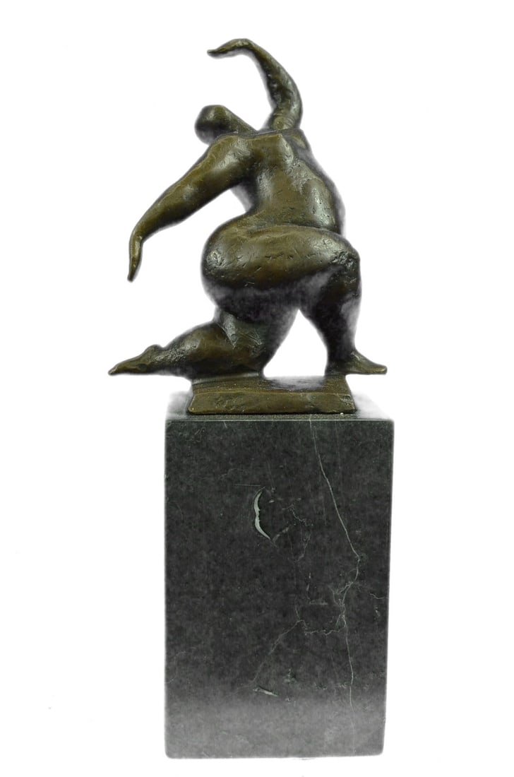 Woman Bronze Sculpture: A beauty poses for a portrait. She stretches her long round body. She kneels and curls an arm upward. Like a classic pinup, she pushes her chest out, tilts her head up, and is ready for her close-up. 
