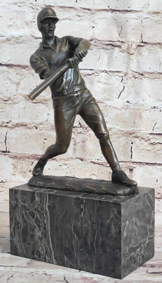 Sport Edition Bronze Sculpture: He is up at-bat. He eyes the pitcher to see what his pitch might be. The ball spirals towards him. He times it and then swings. He plants his feet. His knee bends and his torso twist with the swing. H