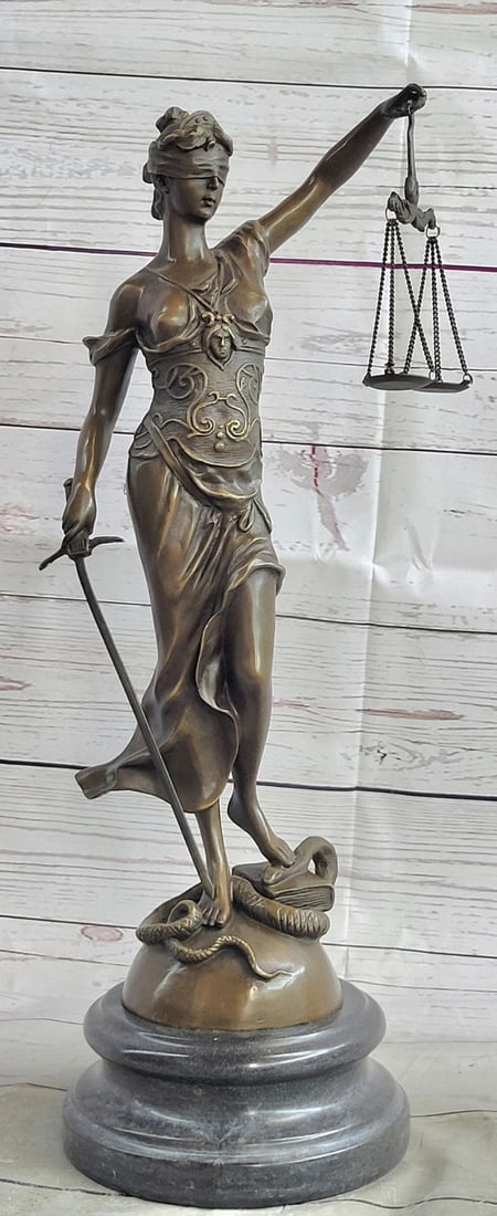 Blind Lady of Justice Bronze Statue: The bronze sculpture is of Lady Justice Roman goddess of Justice who is the symbolic personification of the moral force in judicial systems. As anciently depicted, the blindfolded Lady Justice is seen