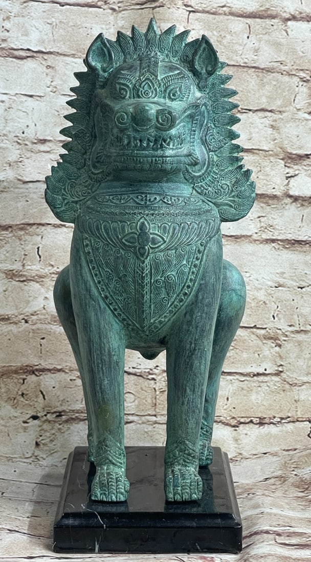 Chinese Guardian Lion Foo Dog Bronze Sculpture: This is a bronze sculpture of a Foo dog which is a Chinese guardian lion, known also as the imperial guardian lion. They are believed to have powerful mystic protective powers and traditionally stood 