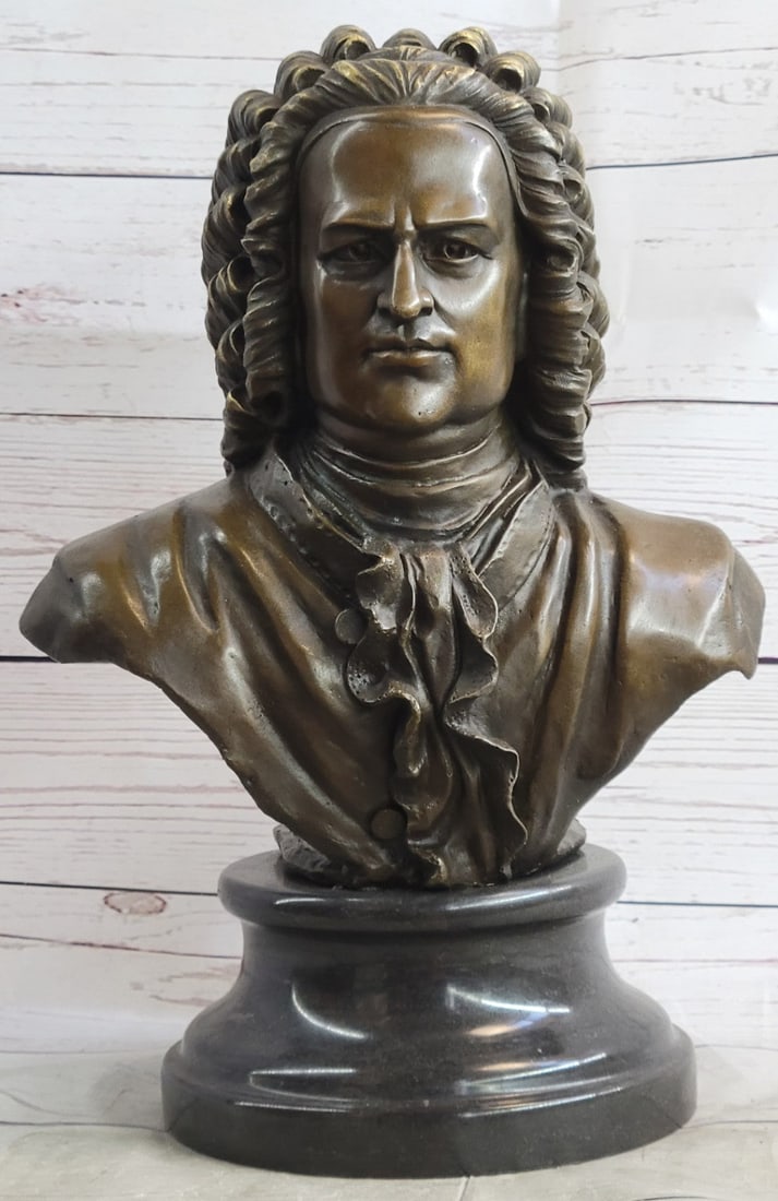 Johann Sebastian Bach The father of Music head Bronze Statue: Johann Sebastian Bach was a German composer, organist, harpsichordist, and violist, and his music is revered for its intellectual depth, technical command, and artistic beauty. This Bronze Statue depi