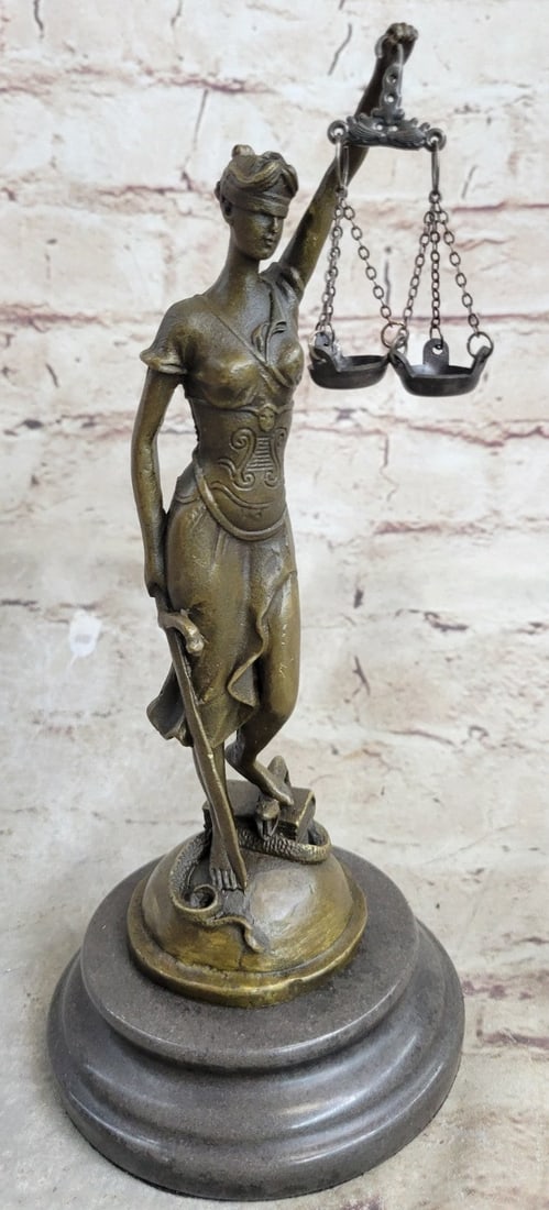 Blind Lady of Justice Bronze Statue: Lady Justice and Blind Justice are the names associated with the feminine image Themis, the goddess of Greek Mythology epitomizing the virtue of Justice. She holds the Sword of Truth in one hand to re