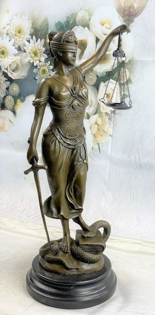 Blind Justice Lady Bronze Sculpture: The Bronze Sculpture is of Lady Justice Roman goddess of Justice who is the symbolic personification of the moral force in judicial systems. As anciently depicted, the blindfolded Lady Justice is seen