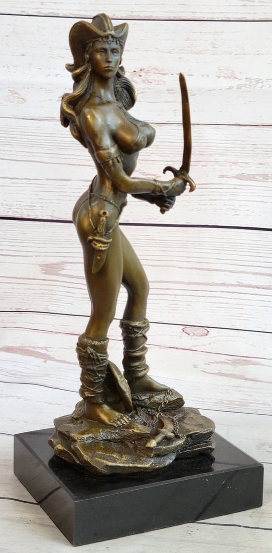 Sexy Amazonian Female Warrior Bronze Sculpture: Strong, skilled, and sexy this Amazonian warrior takes no prisoners. She stands fierce, ready to wield her sword at her opponent. She is tall and fit while maintaining a very womanly curvaceous figure