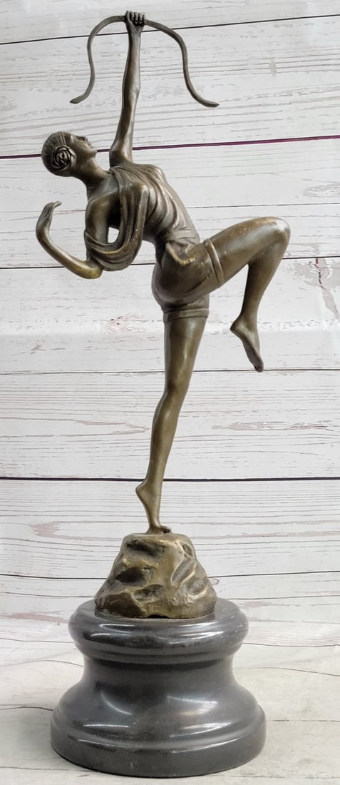Diana the Huntres Bronze Sculpture: This piece is an exquisitely detailed and gorgeous representation of the Greek goddess, Diana. In Roman mythology, Diana Akopyan was the goddess of the hunt, being associated with wild animals and woo