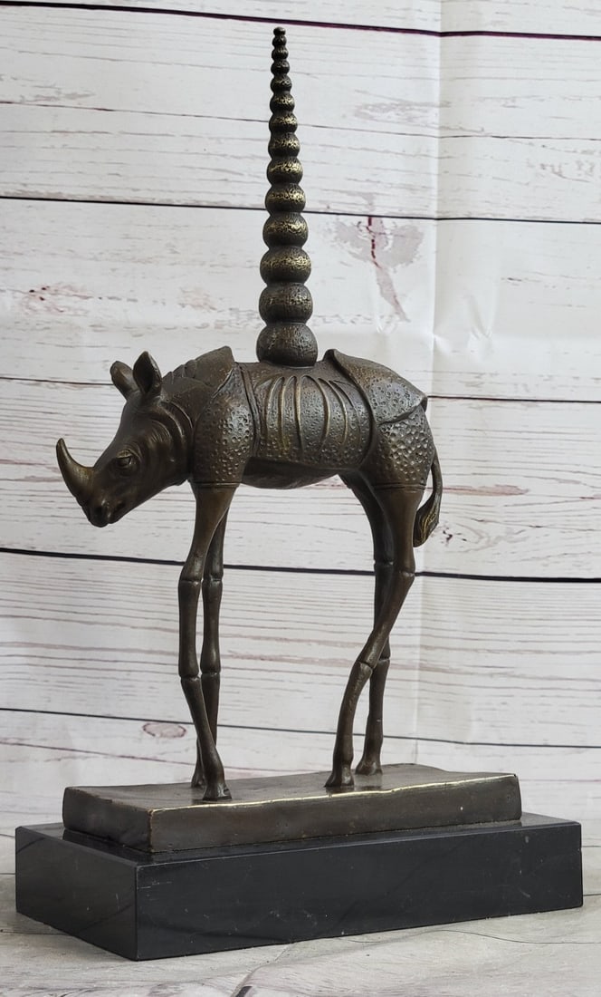 Rhinoceros Detailed Lost Wax Bronze Sculpture: The eccentric public persona with his flamboyant mustache, pet ocelot, and outlandish behavior and quips. Dimensions: Height 14 X Width 8 inches. Weight: 8 LBS.