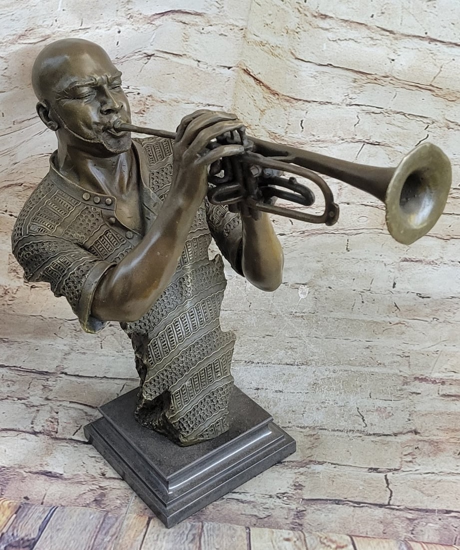 Trumpet Player Bronze Sculpture: This sculpture is an innovative interpretation of the musician. The sculpture takes an abstract form, his arms are invisible. This bronze sculpture was crafted using the lost wax method and rests on